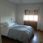 Large bedroom of a Colegio de España shared apartment accommodation