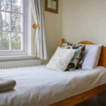 A single bedroom in a Frances King premium homestay