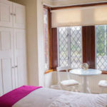 A bedroom in a Frances King premium homestay