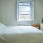 A bedroom in a Frances King deluxe homestay