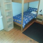 Una stanza da letto del residence per studenti St. Raphaela