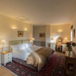 La stanza da letto king-size del Coachman's Cottage