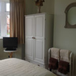 Stanza doppia in un alloggio in famiglia