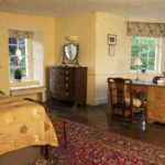A luxury double bedroom at Trebinshun House