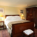 A standard double bedroom at Trebinshun House