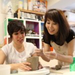 Genki Tokyo school students in a pottery making class