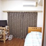 Una stanza da letto di un appartamento privato della scuola Genki Fukuoka