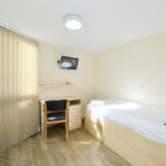 La camera da letto di un residence dell'università di LILA  