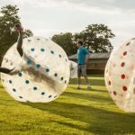 More Than English summer school students play zorb football