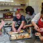More Than English summer school students have a cooking activity