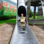 Altitude Summer Camp campers play in the playground