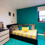 Un alloggio con letto del monolocale di LILA