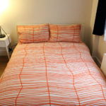 Una camera da letto negli appartamenti Rennert in Midtown Manhattan a New York