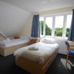 Una stanza doppia nel residence studentesco Logan House 