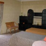 Una stanza da letto del Countryside Apartment della scuola BELS di Gozo, Kercem