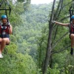 Asheville program teenagers on a ropes course