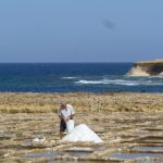 Salt harvesting at Xwejni Gozo, Malta