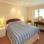 Una camera da letto negli appartamenti  Rosa Executive