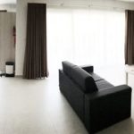 Living room and kitchen of the Astolat Mansions self-catering apartments