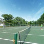 Camp Twin Creeks campers have tennis lessons