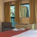 Una stanza da letto della Suite Executive della Casa Vancouver