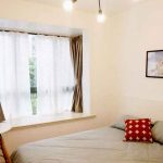 Una camera da letto dell'appartamento in condivisione della That's Mandarin Shanghai 