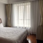 Una camera da letto di un alloggio in famiglia della That's Mandarin Shanghai