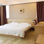  Una camera da letto dell'alloggio della That's Mandarin Shanghai 