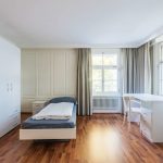 Una stanza singola dell'alloggio dell'Institut auf dem Rosenberg Summer Camp