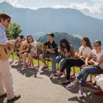 Leysin American School Summer Camp students during an outdoor music lesson