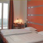 Una stanza doppia dell'alloggio della SLC Leysin Summer Camp