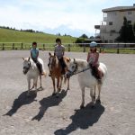 Alpadia Leysin Summer Camp students ride horses