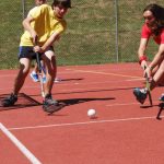 Alpadia Leysin Summer Camp students play uni-hockey