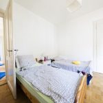 Double bedroom in an Alpadia Montreux Summer Camp homestay