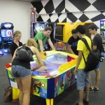 Alpadia Montreux French Summer Camp students go to an arcade