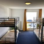 Una stanza quadrupla nell'alloggio dei Village Camps Leysin Summer Camp