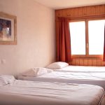 Una stanza tripla dell'alloggio del Campo Estivo Les Elfes