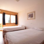 Una stanza doppia dell'alloggio del Campo Estivo Les Elfes