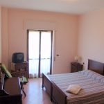 Double bedroom in the Piccola Università Italiana Tropea accommodation