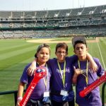 Tamwood San Francisco Summer Camp students watch a baseball game