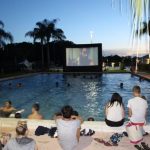 LAL Boca Raton Summer School students watch movie at the pool