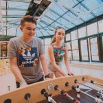 Actilingua Summer School Vienna students play table soccer