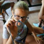 Alphabet Outdoor Exploration campers learn knot-tying skills