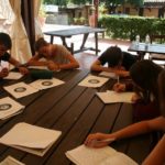 Alphabet Outdoor Exploration Camp students in class