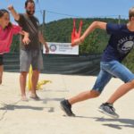 Alphabet Outdoor Exploration Camp students play Capture the Flag