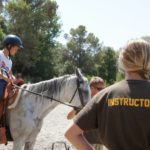 Alphabet Outdoor Exploration Camp students go horseback riding