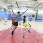 Sevenoaks Summer School students play basketball