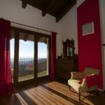 Una camera da letto della Cascina il Faggio