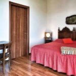 Una camera da letto della Cascina il Faggio