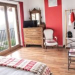 Una camera da letto della Cascina il Faggio